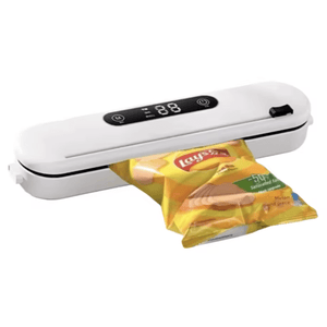 Vacuum sealer in use sealing snack bag